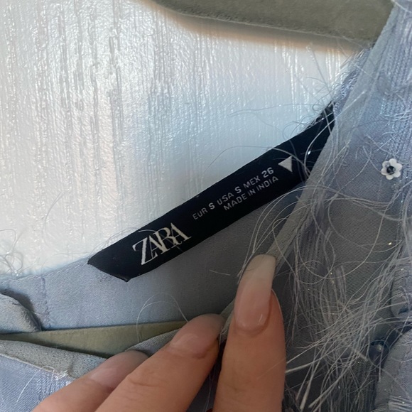 Blue textured blouse with button back detailing - Picture 7 of 7